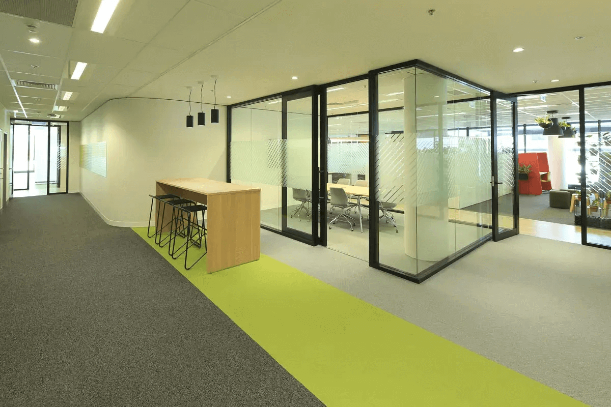 Acoustic design elements in open plan office with panels and soft materials